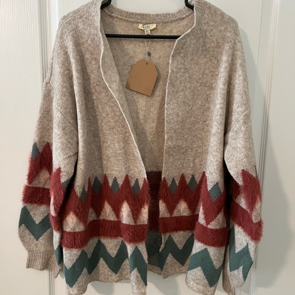 Brand New Kori Sweater. Size M/L